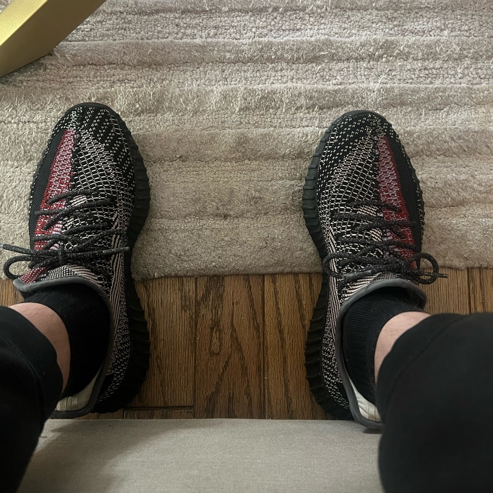 Yeezy Black and Red Sneakers with Knitted Upper